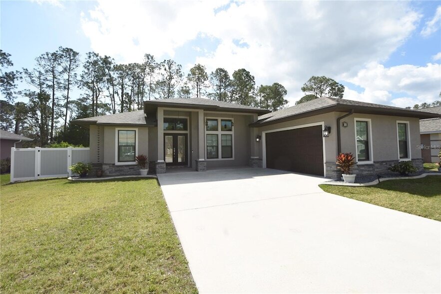 13 Elder Dr, Unit 3319-02R in Palm Coast, FL - Building Photo