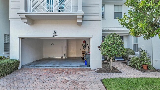 4137 Darlington St, Unit 4-414 in Palm Beach Gardens, FL - Building Photo - Building Photo