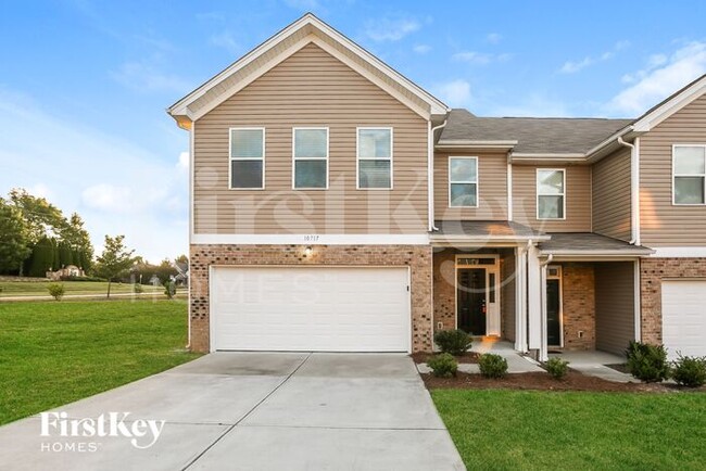 property at 10717 Rivergate Dr NW