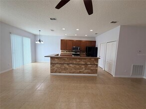 1860 Piedmont Ct in Mascotte, FL - Building Photo - Building Photo