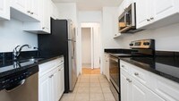 Kitchen with Stainless Steel Appliances - The Towers at Longfellow Apartments in Boston, Massachusetts