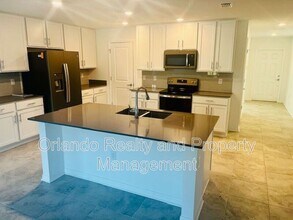 1910 Birnham Wood Bnd in Kissimmee, FL - Building Photo - Building Photo