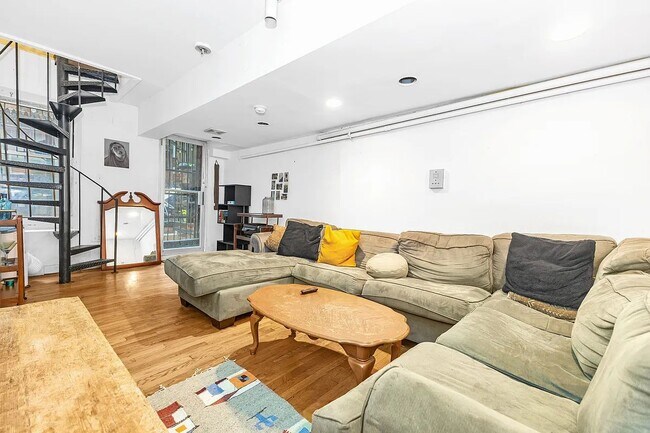 property at 99 E 7th St