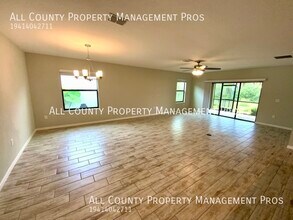 15293 Mille Fiore Blvd in Port Charlotte, FL - Building Photo - Building Photo