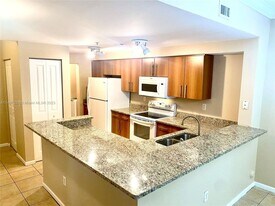 5900 W Sample Rd, Unit 105 in Coral Springs, FL - Building Photo