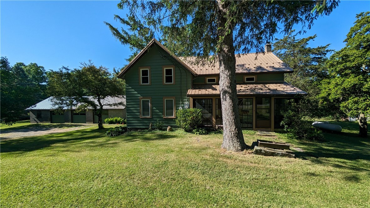 1126 Trumbulls Corners Rd in Newfield, NY - Building Photo