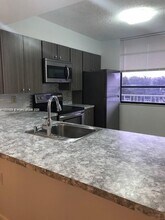 1715 Whitehall Dr, Unit 405 in Davie, FL - Building Photo - Building Photo