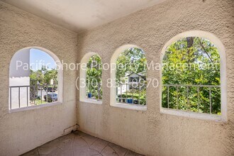107 N Mansfield Ave in Los Angeles, CA - Building Photo - Building Photo