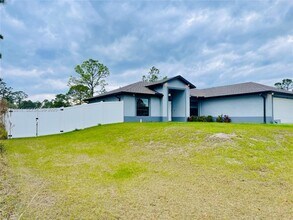 1703 Edison Ave in Lehigh Acres, FL - Building Photo - Building Photo