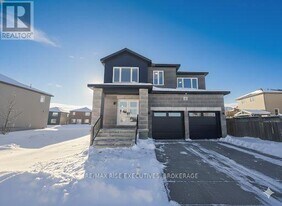 80 Dusenbury Dr. in Loyalist, ON - Building Photo