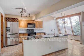 12445 W Ellsworth Pl in Lakewood, CO - Building Photo - Building Photo