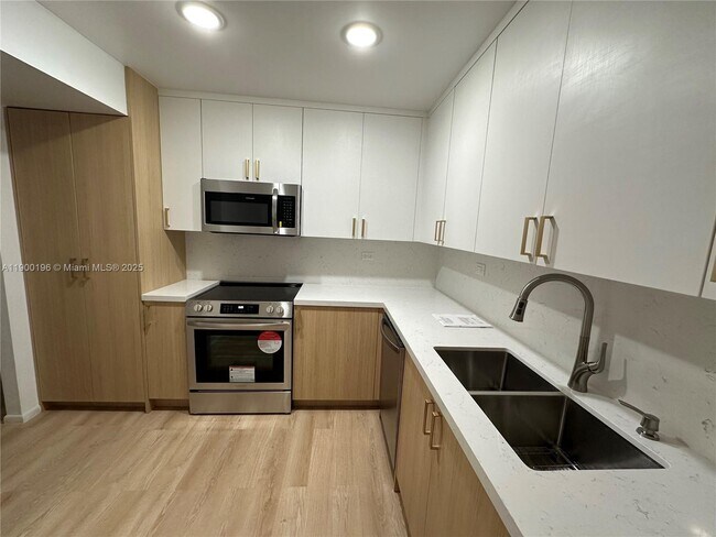 property at 6039 Collins Ave