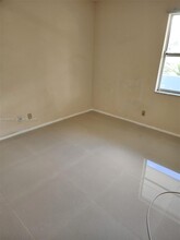 8370 Sands Point Blvd in Tamarac, FL - Building Photo - Building Photo