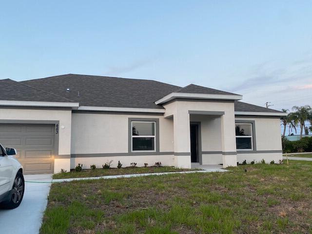 483 SE Sunnydale Ln in Port St. Lucie, FL - Building Photo