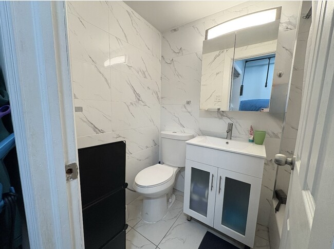 6115 97th St, Unit Studio apt #15P in Rego Park, NY - Building Photo - Building Photo