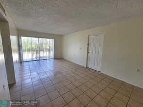 1133 Benoist Farms Rd in West Palm Beach, FL - Building Photo - Building Photo