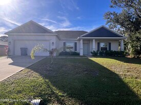 1031 Grapefruit Rd SE in Palm Bay, FL - Building Photo