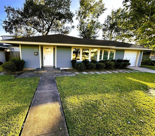 property at 5111 Maple St