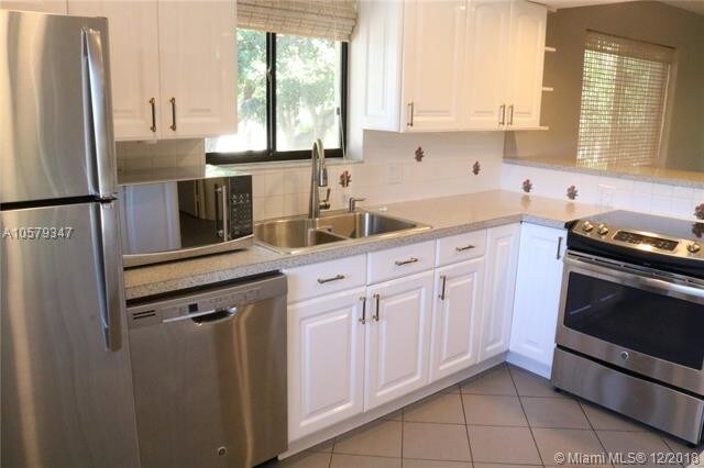 16571 Blatt Blvd-Unit -201 in Weston, FL - Building Photo - Building Photo