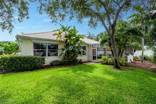 1511 Whispering Oaks Cir in Naples, FL - Building Photo - Building Photo