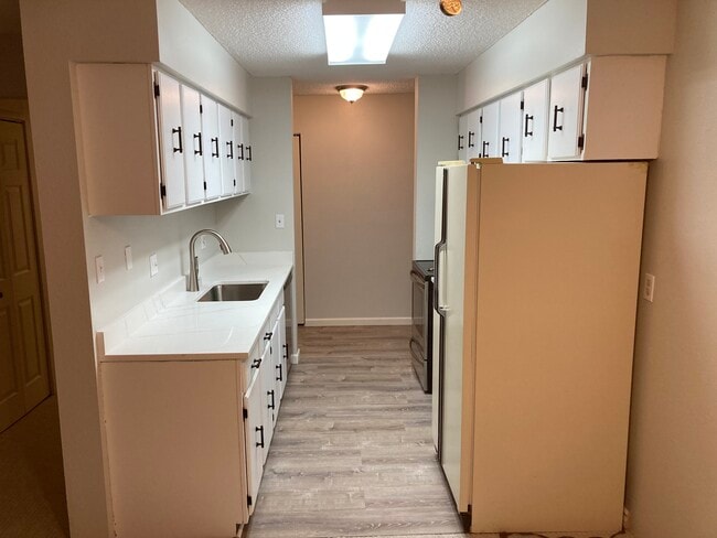 7755 E Quincy Ave, Unit Whispering Pines Of Denve in Denver, CO - Building Photo - Building Photo