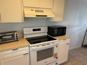 5157 Silent Loop, Unit 115 in New Port Richey, FL - Building Photo - Building Photo