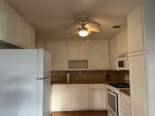 property at 102 E Pecan St