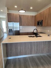 1416 Wanderlust Ln in Four Corners, FL - Foto de edificio - Building Photo