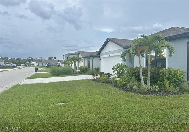 16037 Beachberry Dr in North Fort Myers, FL - Building Photo - Building Photo
