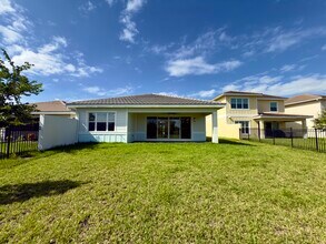 1346 Harvester Xing in Loxahatchee, FL - Building Photo - Building Photo