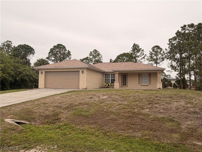 208 Homewood Ave S in Lehigh Acres, FL - Building Photo - Building Photo
