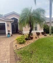 20700 Persimmon Pl in Estero, FL - Building Photo - Building Photo