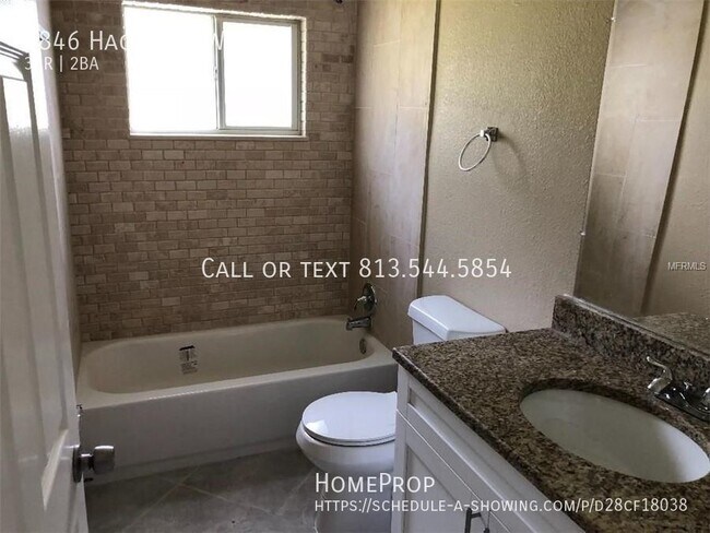 1846 Hacienda Way in Holiday, FL - Building Photo - Building Photo