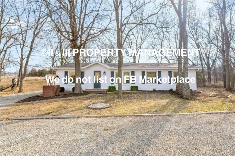 62 Redwood Ln in Lacygne, KS - Building Photo