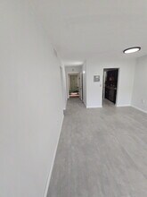 11610 N Bayshore Dr, Unit 1H in North Miami, FL - Building Photo - Building Photo