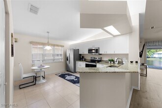 7435 Plumbago Bridge Rd in Naples, FL - Foto de edificio - Building Photo