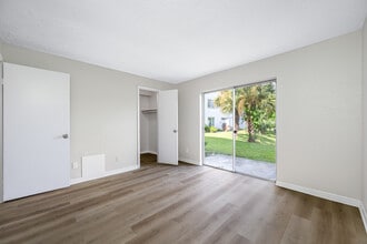 KC Flats Apartments in Kenneth City, FL - Building Photo - Building Photo