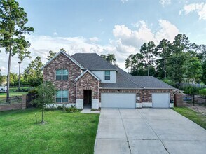 105 Whelan Ln in New Waverly, TX - Building Photo - Building Photo
