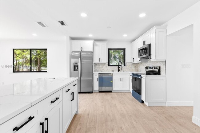 property at 14171 SW 37th Ct