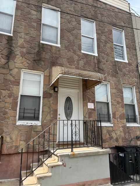 property at 60-50 55th St