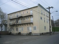 111-117 Geneva St in Lyons, NY - Foto de edificio - Building Photo