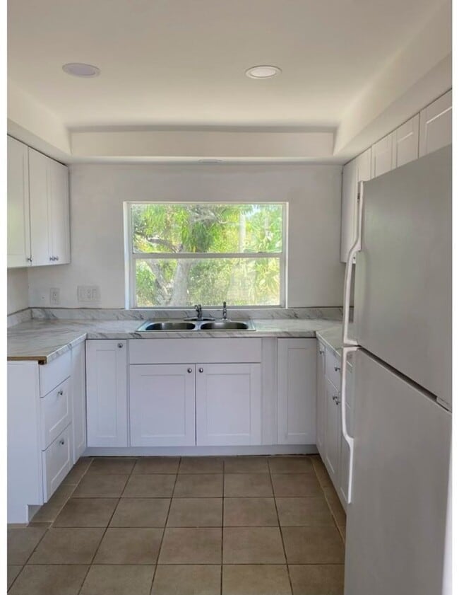 property at 310 W Blue Heron Blvd