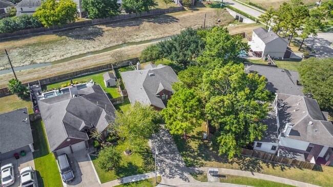 property at 15027 Winding Black Cherry Ln