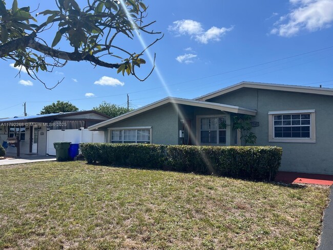 property at 7740 NW 11th St