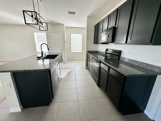 7641 Tuscan Bay Cir in Wesley Chapel, FL - Building Photo - Building Photo