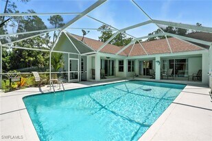 5891 Golden Oaks Ln in Naples, FL - Building Photo