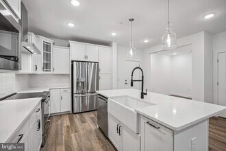 21731 Dovekie Ter, Unit Unit 403 in Ashburn, VA - Building Photo - Building Photo