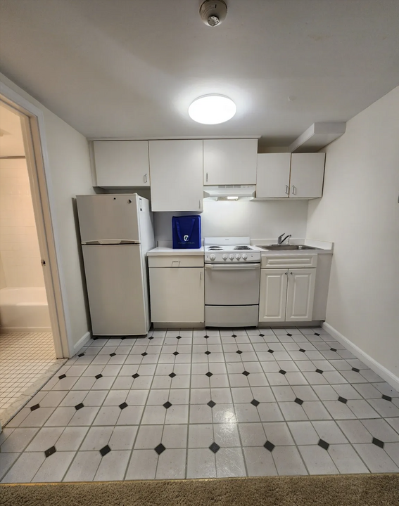 1240 Beacon St, Unit 114 in Brookline, MA - Building Photo