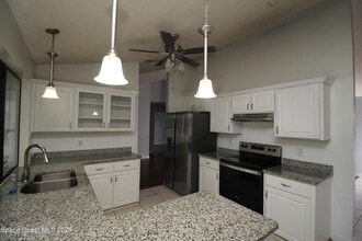 1009 Fairplay Ave NW in Palm Bay, FL - Building Photo - Building Photo