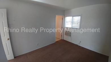 1111 Amherst Dr SE-Unit -39 in Albuquerque, NM - Building Photo - Building Photo